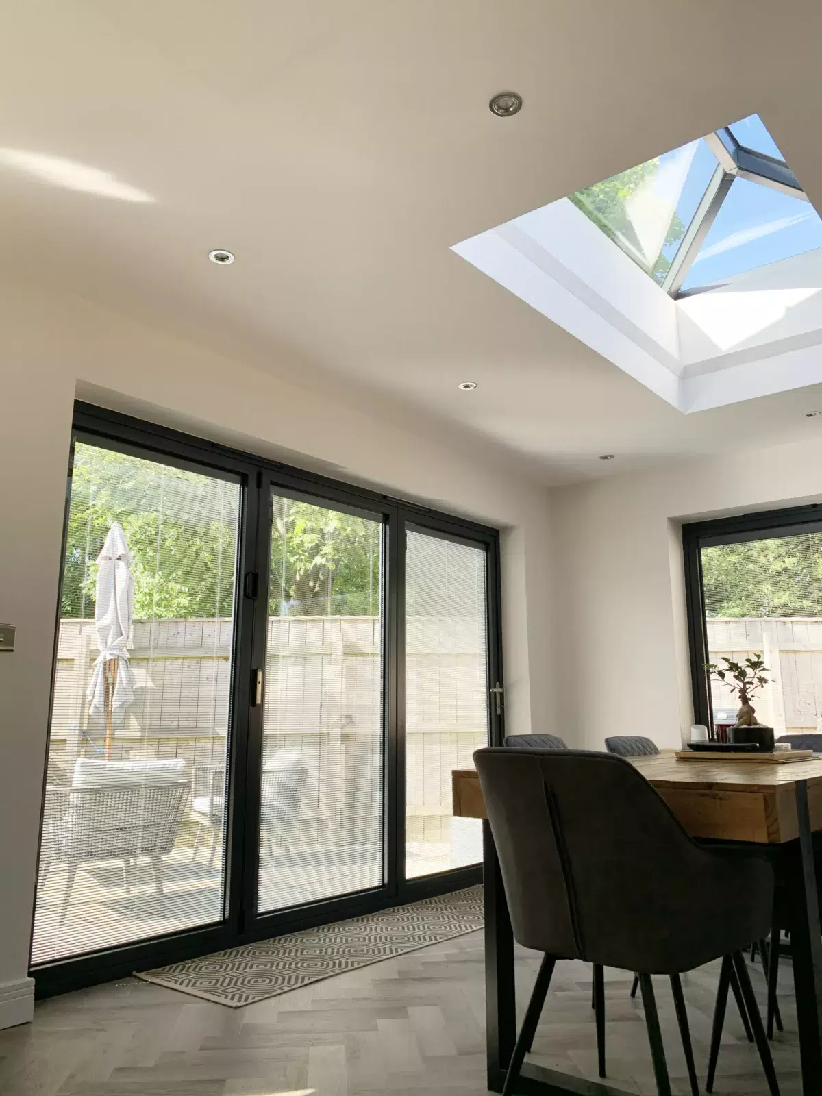 Korniche Bi-folding Door showcasing sleek design and modern functionality.