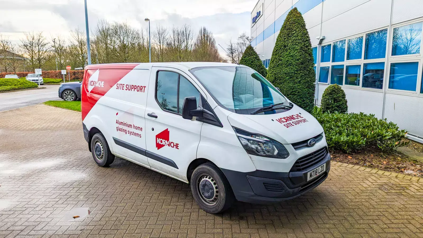Made for Trade Korniche Site Support Van Made for Trade branded Korniche site support van with company logo on the side.