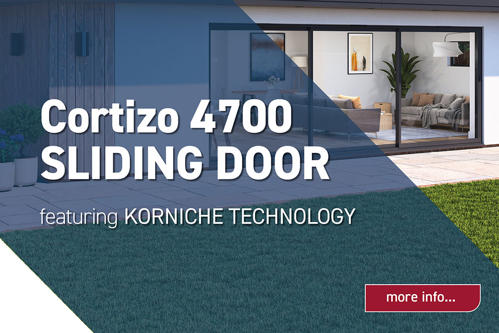 A modern home featuring the Cortizo 4700 Sliding Door, prominently displaying the text 