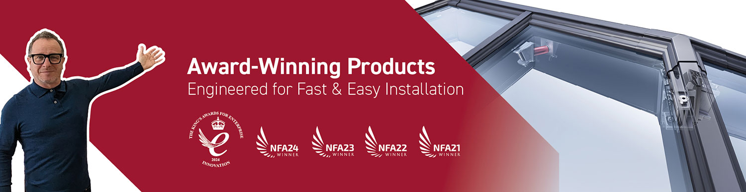 Mark Millar showcasing award-winning rooflights engineered for fast and easy installation, featuring several NFA winner badges and a Queen's Award for Enterprise.