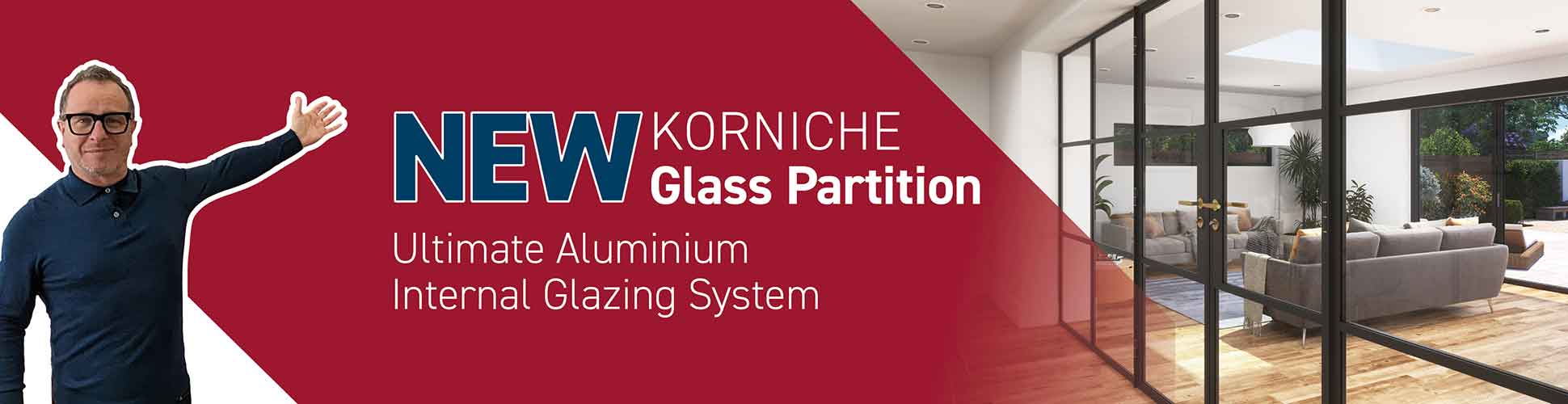 Korniche aluminium glass partition installed in a stylish open-plan living area with black framed internal glazing