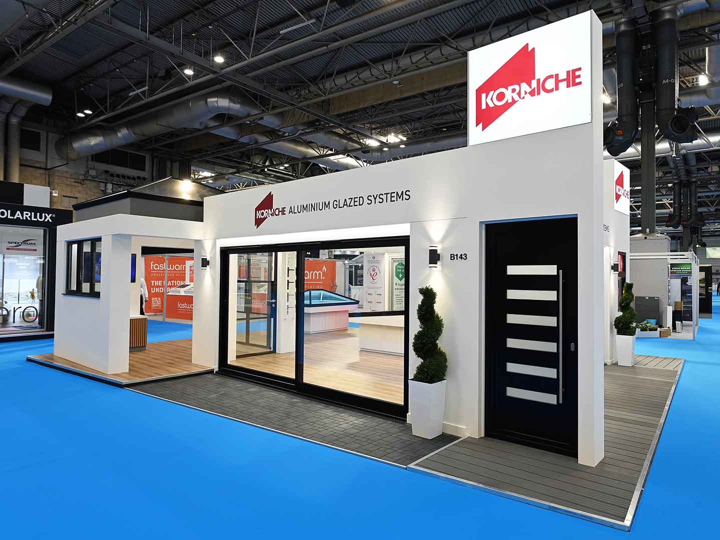 Korniche stand at Harrogate Homebuilding and Renovating Show displaying bifold doors and roof lantern products