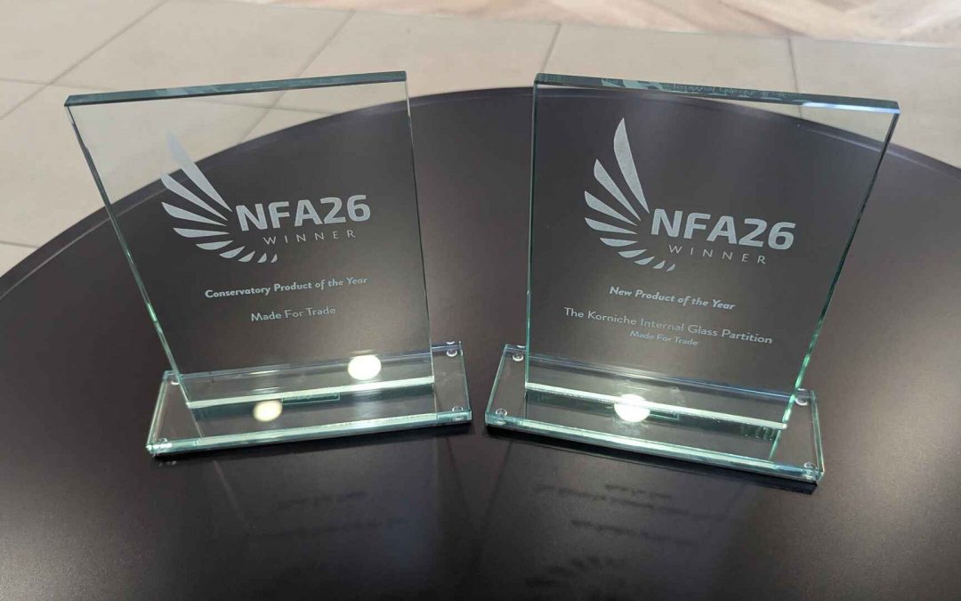 Close-up of Made For Trade's two NFA 2026 trophies for Conservatory Product of the Year and Korniche Internal Glass Partition New Product of the Year.